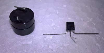 Bend pins on buzzer and transistor as shown