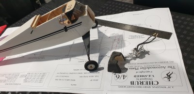 original motor &amp; cowl, but with as-built nose squared off. Note the packer at the wing TE.