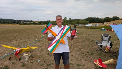 Graham with his Weekender and spot landing prize. The model was built by the late Wayne Hadkins