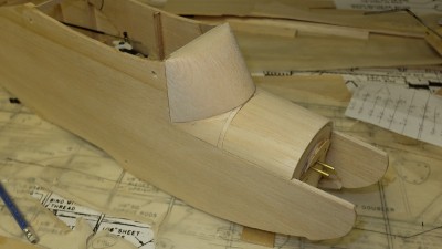 I made a lot of changes in the nose area to accommodate a modern motor mount, fuel tank etc. At this point I was not sure about a .15 being able to fly this thing and needed an option to be able to change mounts if needed.