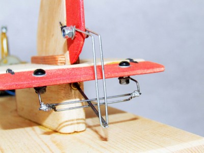 9 - Known as the Bird Cage, this wire bending was necessary to translate the motion of the Mighty Midget motor to rudded and elevator movements..JPG (173.67 KiB) Viewed 12854 times Known as the Bird Cage, this wire bending was necessary to translate the motion of the Mighty Midget motor to rudded and elevator movements