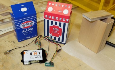 The XHT module will go into one of the <br />simulated Burgess batteries, 9.6V NiMh battery<br />pack into the other one. <br />The EverReady battery will remain empty