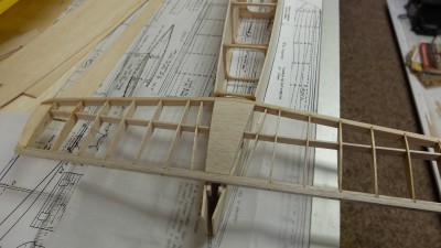 Out of the jig with the stab placed on the tail end I noticed a potential problem. The center sheeting matched the fuse edges perfectly - no extra wood to attach covering after gluing in place or if repairs are needed later. I added a couple of extra ribs approx 1/2&quot; farther out.