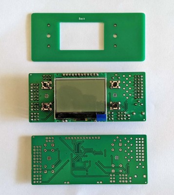 Template, an assembled encoder and an unpopulated board waiting assembly