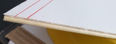 3mm bamboo skewers attached to the Fin leading edge with hot glue. Red line is where the coloured tape will stop (board thickness + a 5mm fillet)