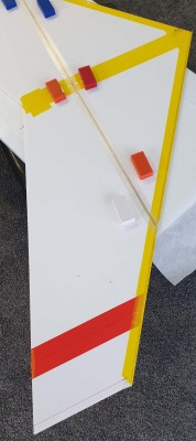 the wing was kept flat on the steel shelf building board using the magnets